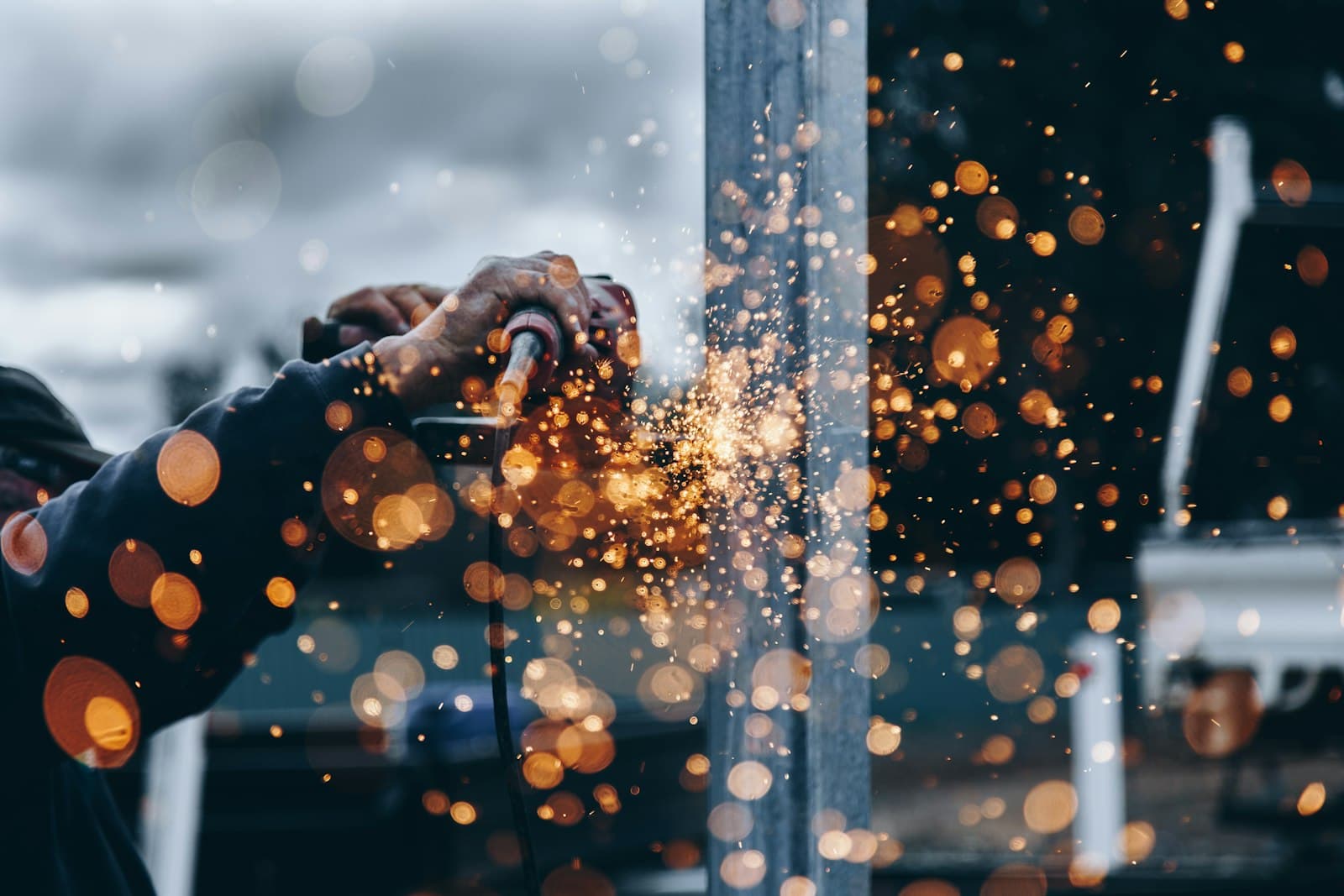 Skilled metalworkers crafting a product